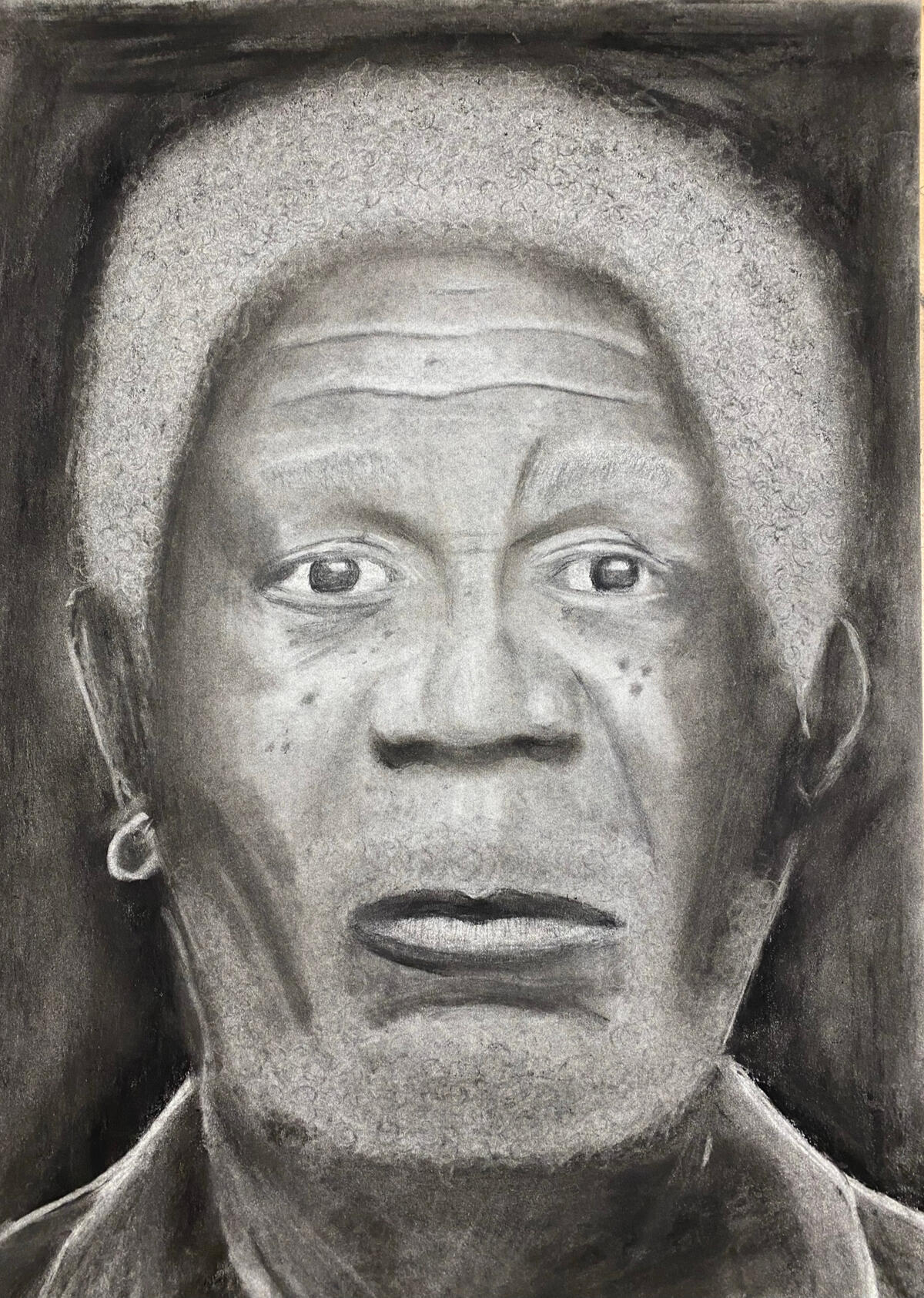 Morgan Freeman A charcoal portrait of Morgan Freeman.
